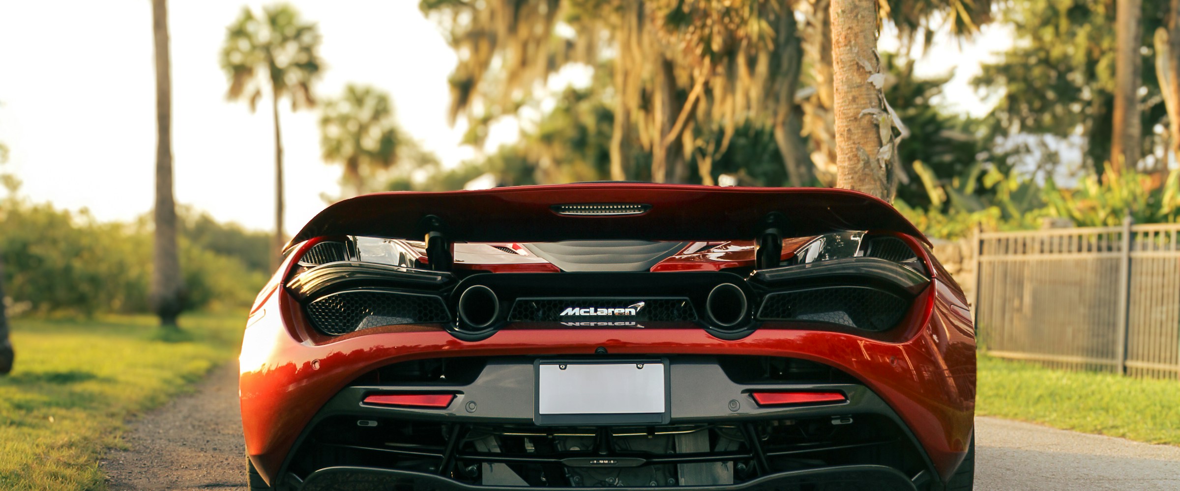 Red McLaren sports car available with financing from 411 Drives